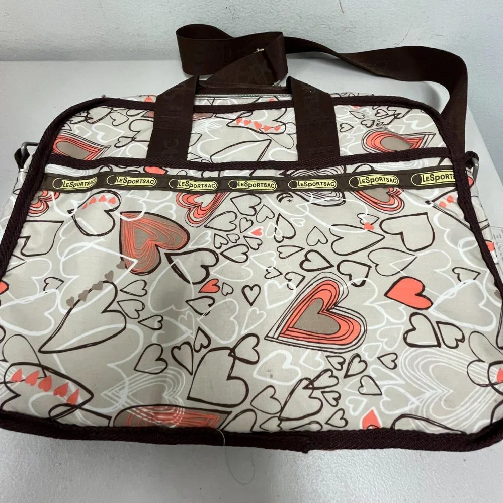 Le Sportsac computer messenger bag 11 x 15 hearts pink brown shoulder strap